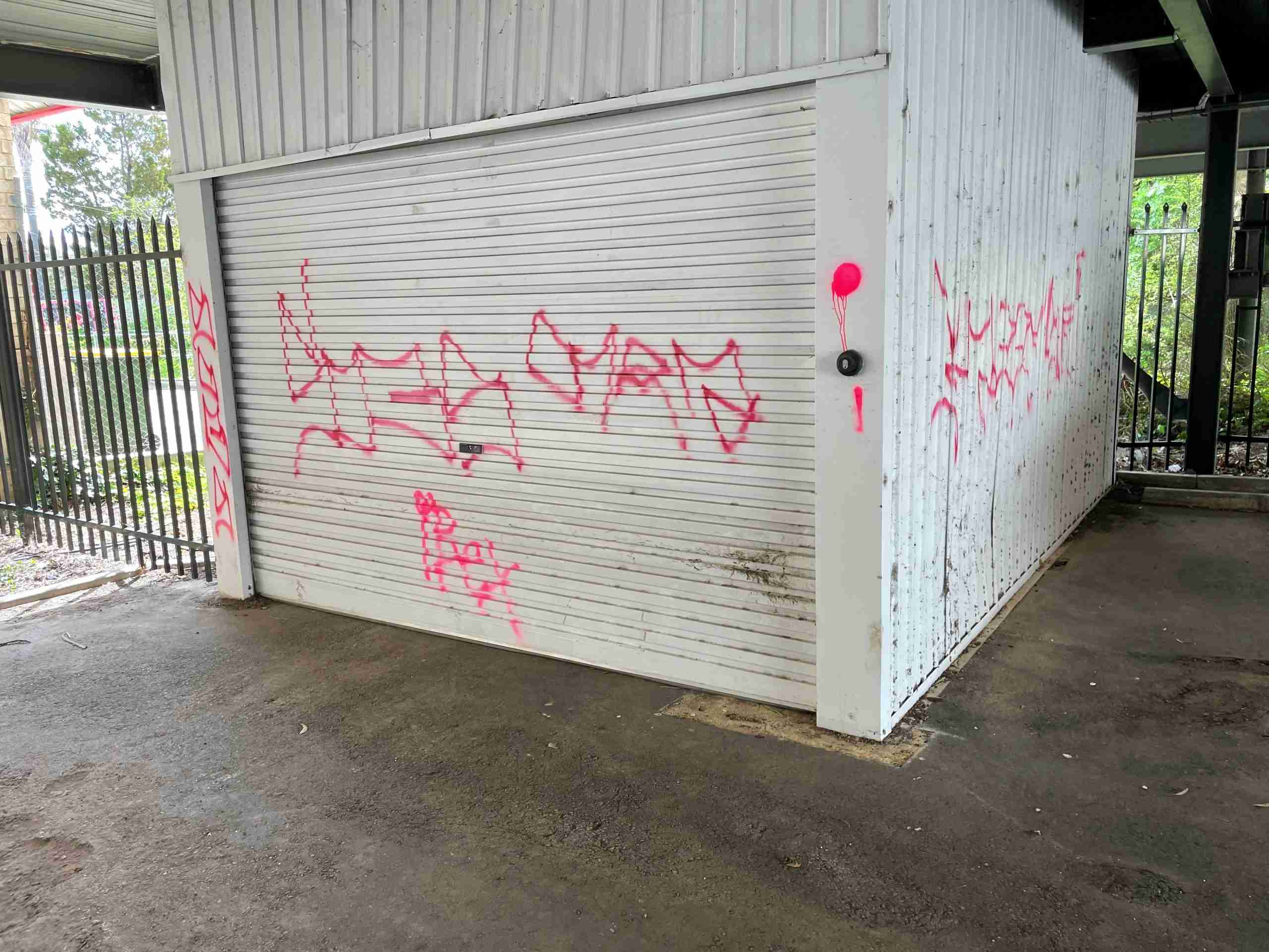 Graffiti removal from carpark before Carpark covered with graffiti to demonstrate graffiti removal benefits